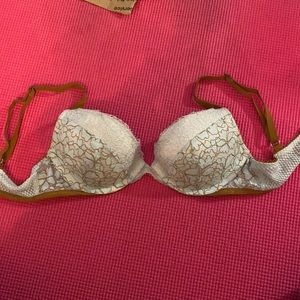Sexy push up Victoria’s Secret bra. Light blue lace with gold straps.